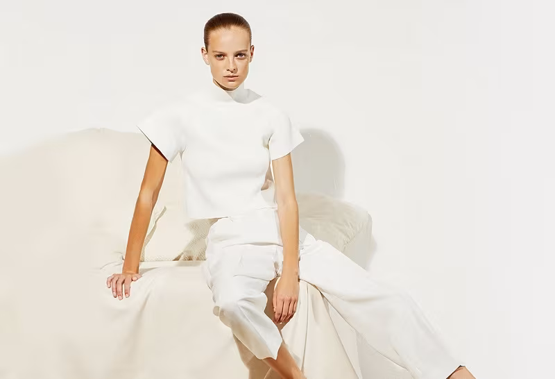 Khaite Stephanie flared-sleeve cropped top