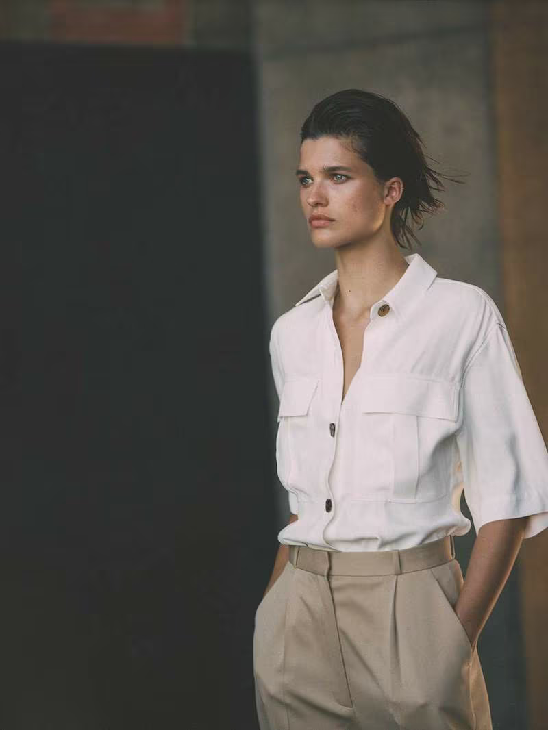 Khaite Leila Crepe Peplum Top